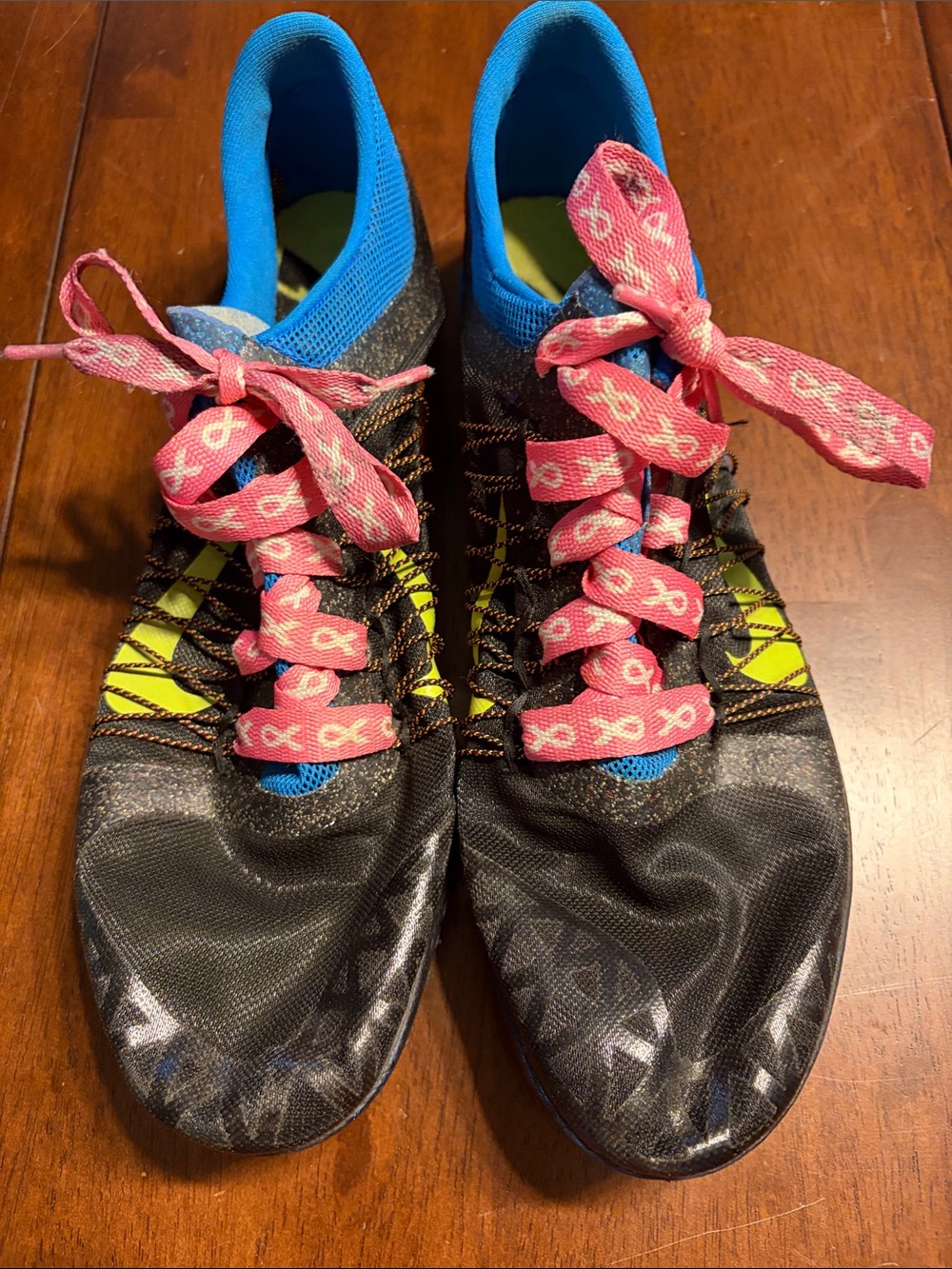 Nike Women's Athletic Running Shoes in Black, Blue, Pink and Yellow w studs